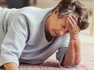 Woman suffering with dizziness and vertigo