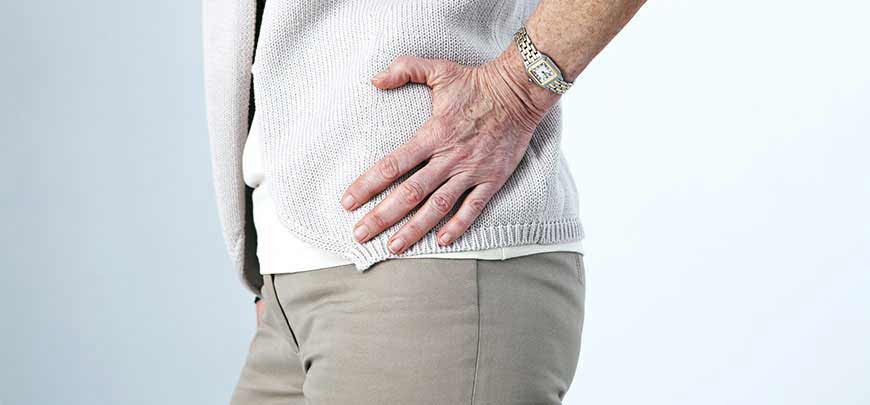 Patient experiencing hip pain and in need of a chiropractor